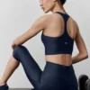 Koszulka bez rękawów z wbudowanym biustonoszem Airlift Super Sleek – granatowa