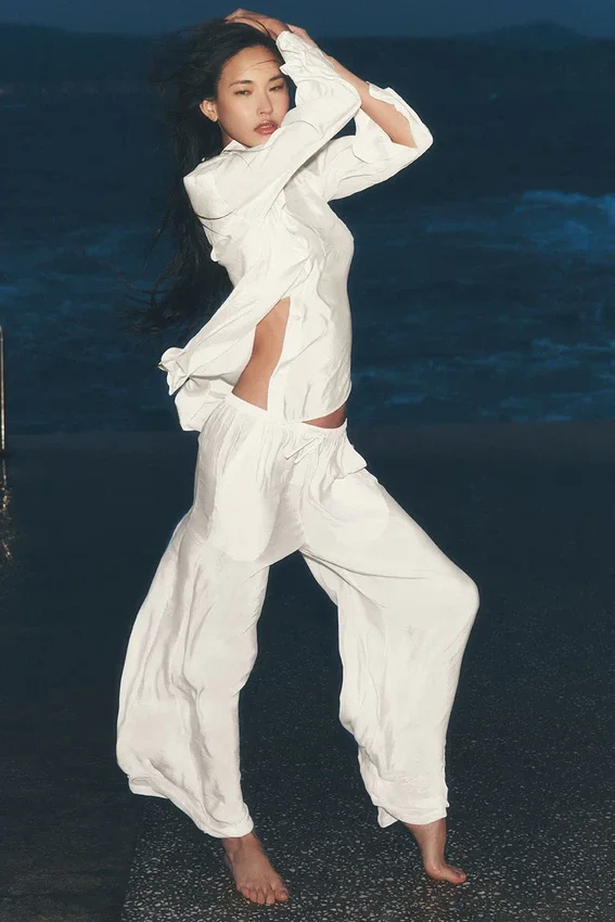 Półprzezroczyste High-Waist Straight Leg Pants „Golden Hour” – kolor kości słoniowej