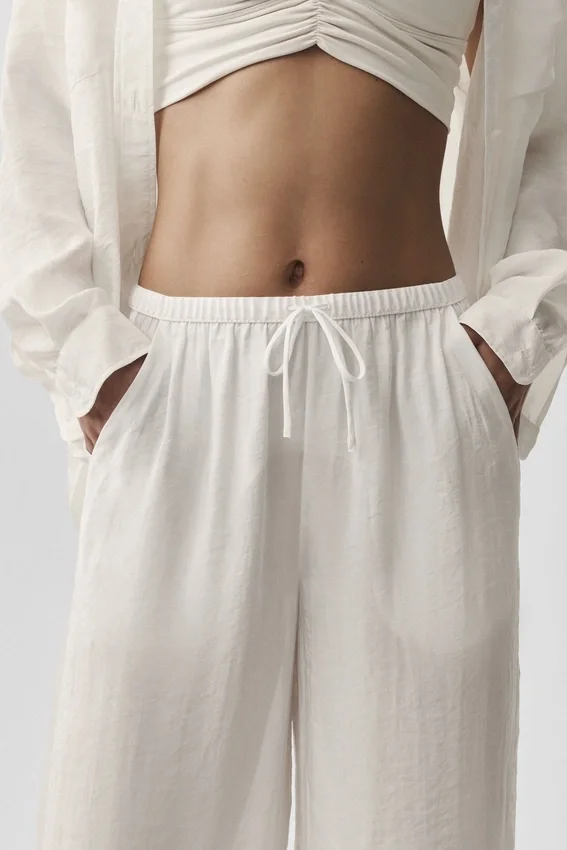 Półprzezroczyste High-Waist Straight Leg Pants „Golden Hour” – kolor kości słoniowej