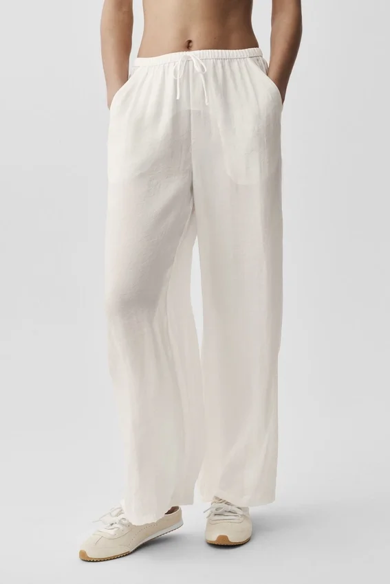 Półprzezroczyste High-Waist Straight Leg Pants „Golden Hour” – kolor kości słoniowej