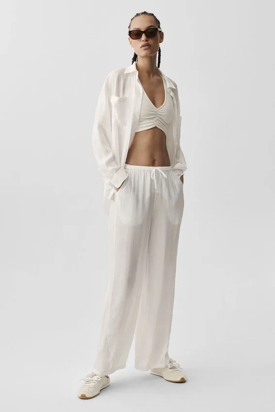 Półprzezroczyste High-Waist Straight Leg Pants „Golden Hour” – kolor kości słoniowej