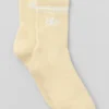 Skarpety unisex typu half-crew w stylu retro – żółty Candlelight/biały