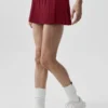 Spódnica tenisowa z niskim stanem „Amp It up” – kolor Summer Romance Red