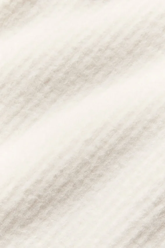 Spodnie High-Waist z szerokimi nogawkami „Snuggle up Sweater” – kolor kości słoniowej